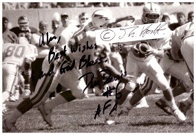 DEE DOWIS (1968-2016) American college football player who was a quarterback for the Air Force Falcons. He graduated as the NCAA's all-time leading rusher for a quarterback.